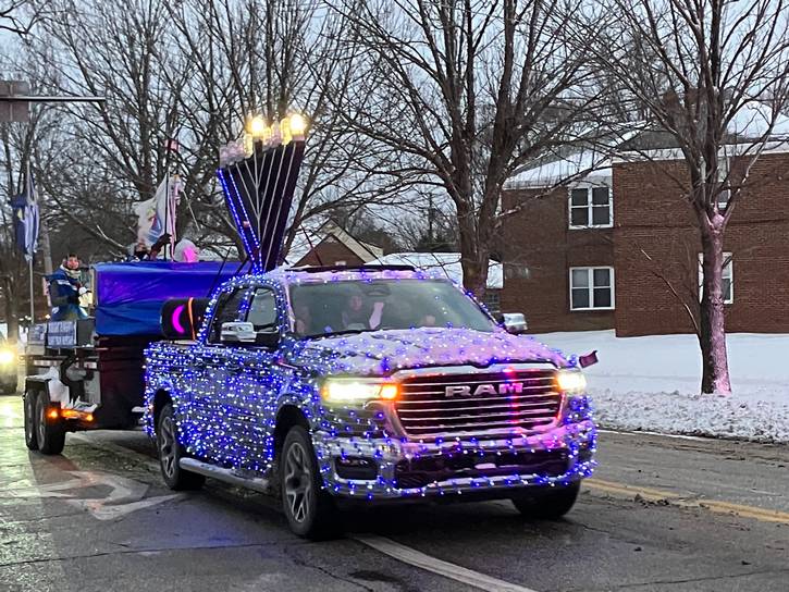 The Light After Dark Menorah Parade.